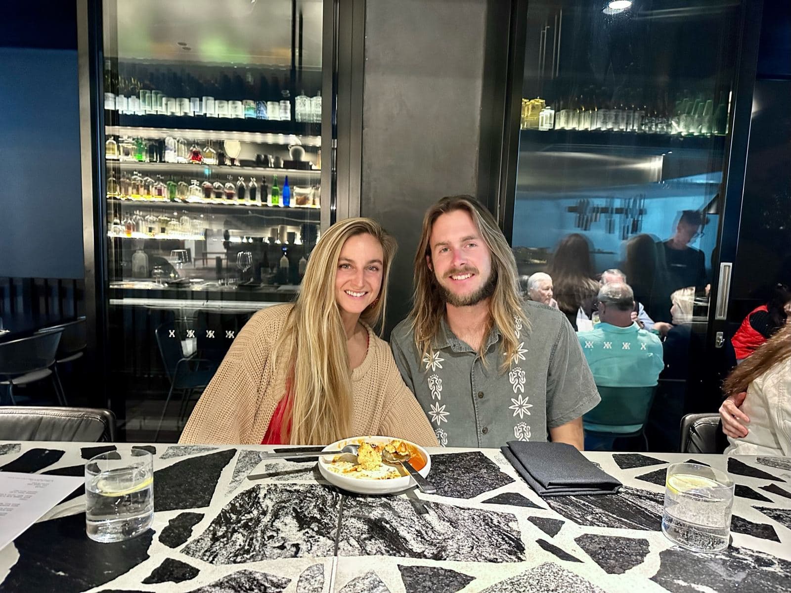 Dinner out, grinning across the table