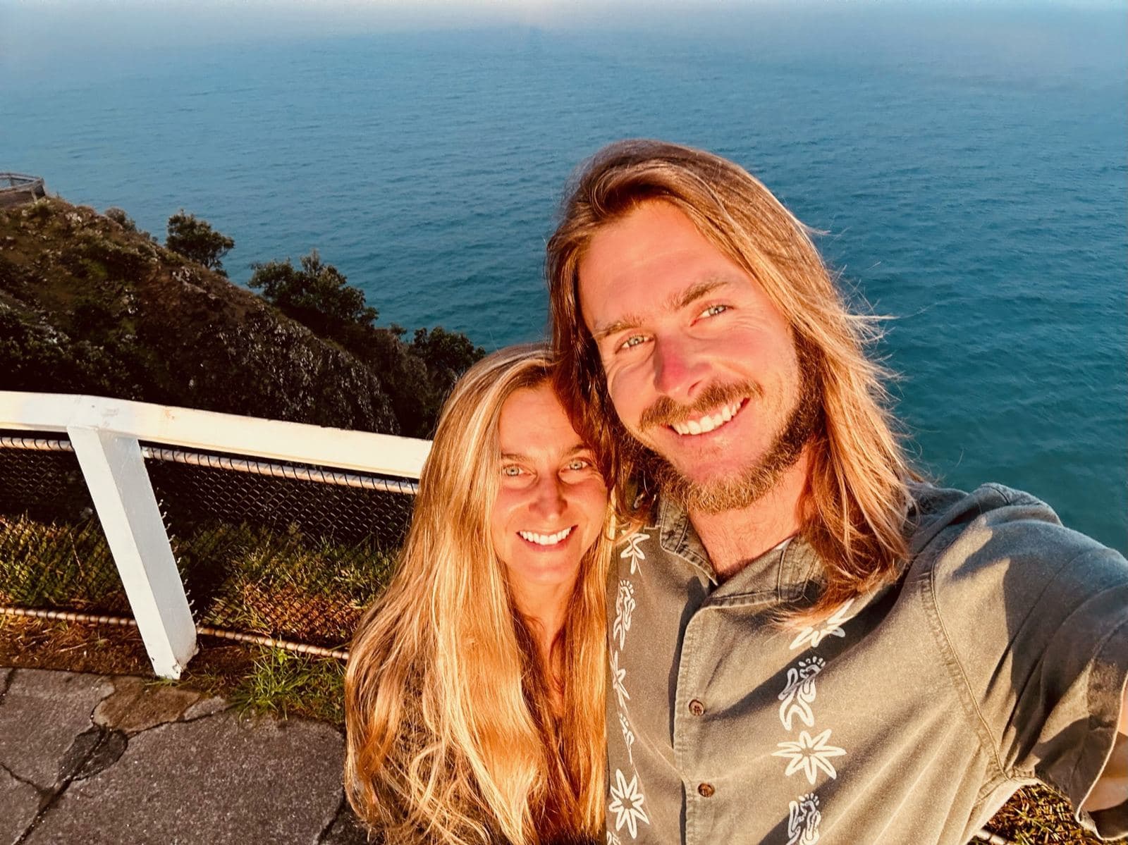Cody and Falyn on a clifftop above the sea