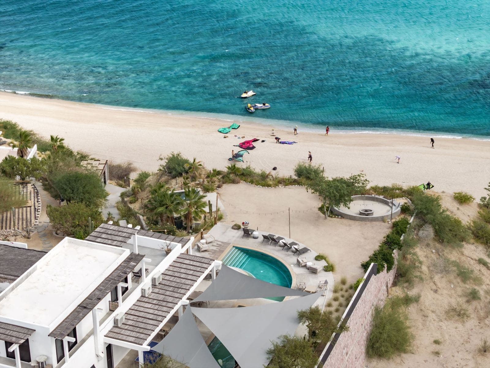 The hotel from above, with the pool, the dunes and the beach